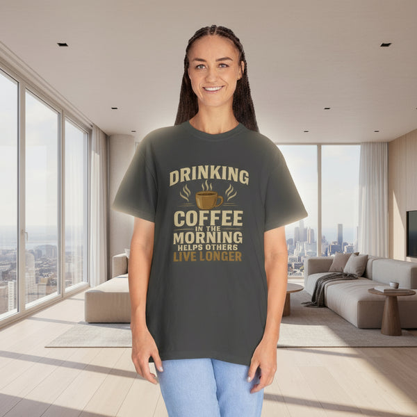 Person wearing a dark gray t-shirt with a humorous coffee-themed graphic and text.