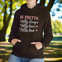 Be Pretty hooded sweatshirt features a classic pullover design with a