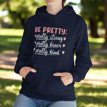 Be Pretty hooded sweatshirt features a classic pullover design with a