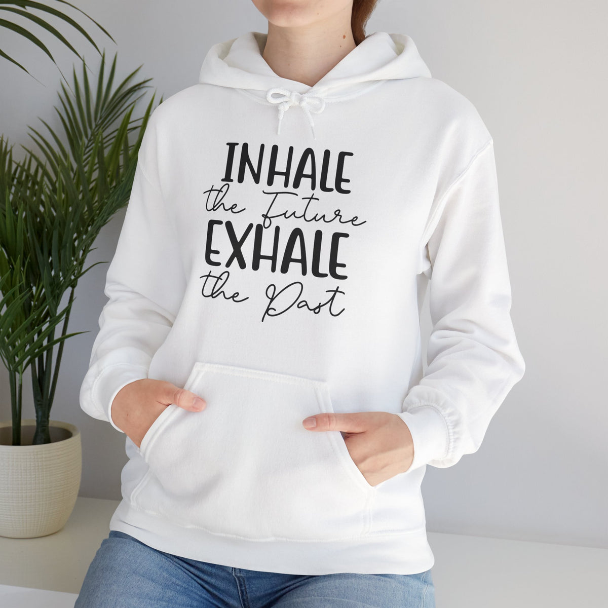 Inhale The Future Exhale The Past hooded sweatshirt features a classic