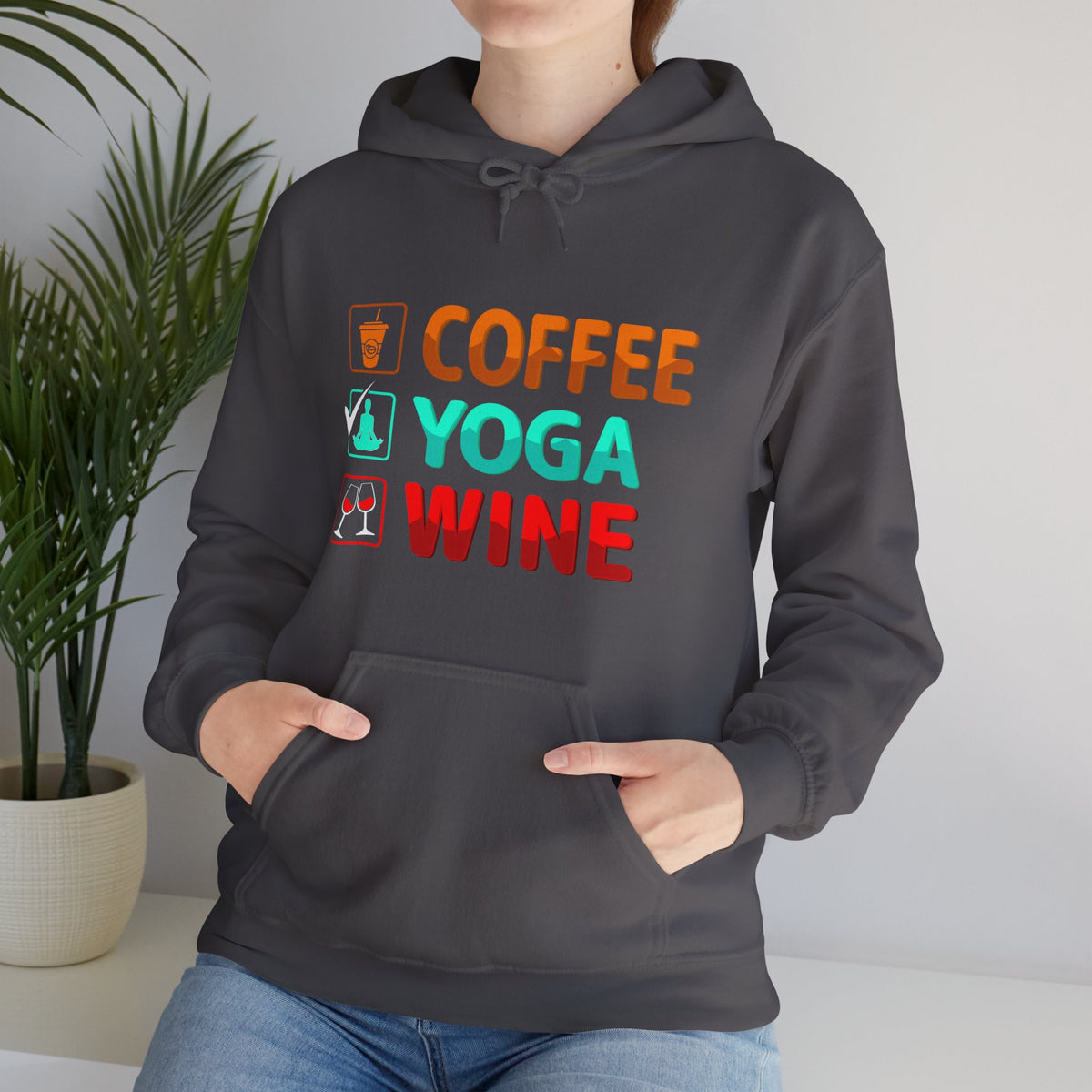 Coffee Yoga Wine hooded sweatshirt features a classic pullover design 